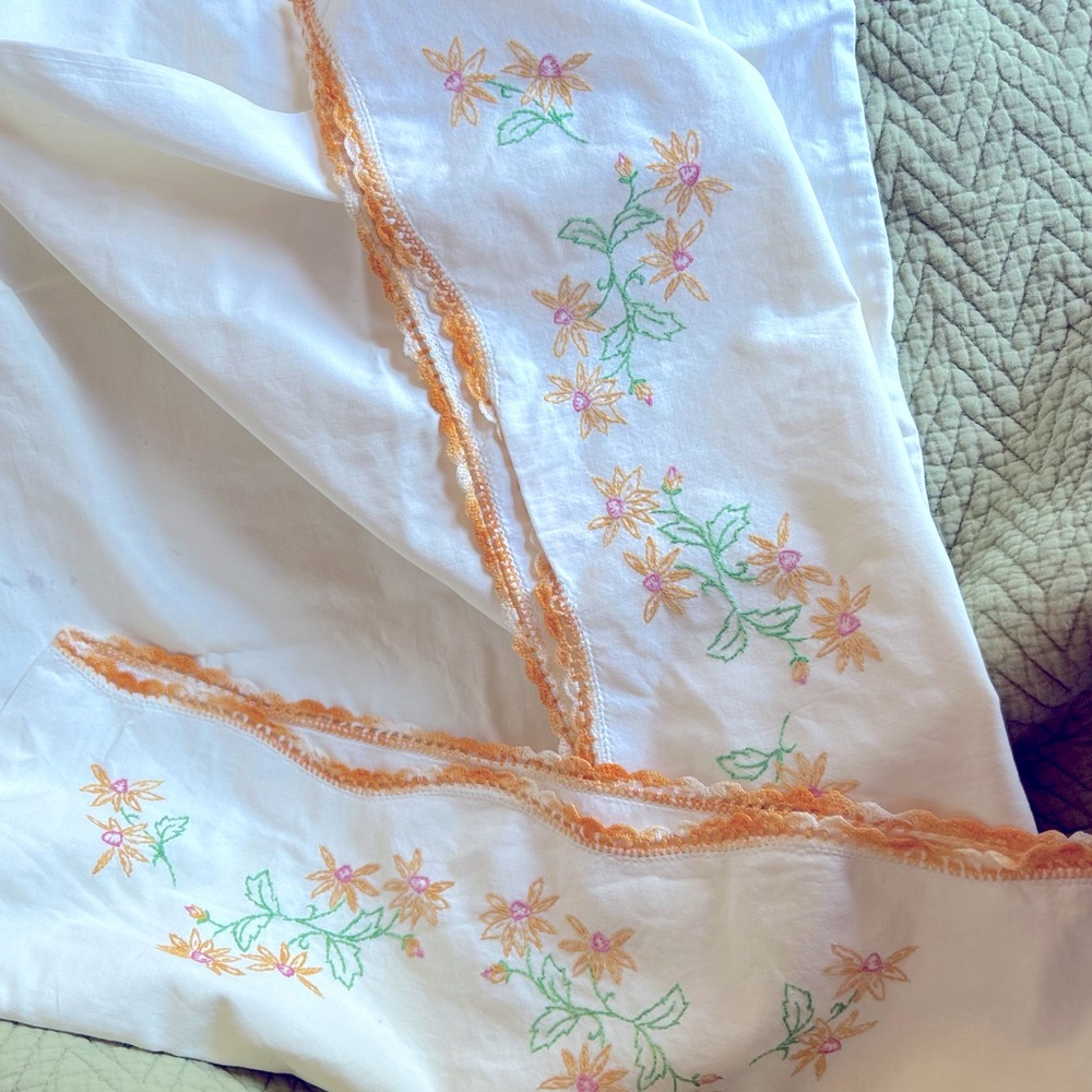 Antique hand, embroidered cotton pillowcases